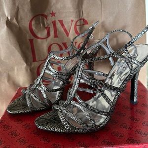 Guess by Marciano animal print size 7.5 . Great condition.